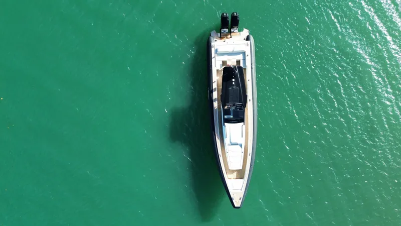 Slide: The Image of Aerial view of 2023 Technohull 47 Omega on turquoise water. - 14