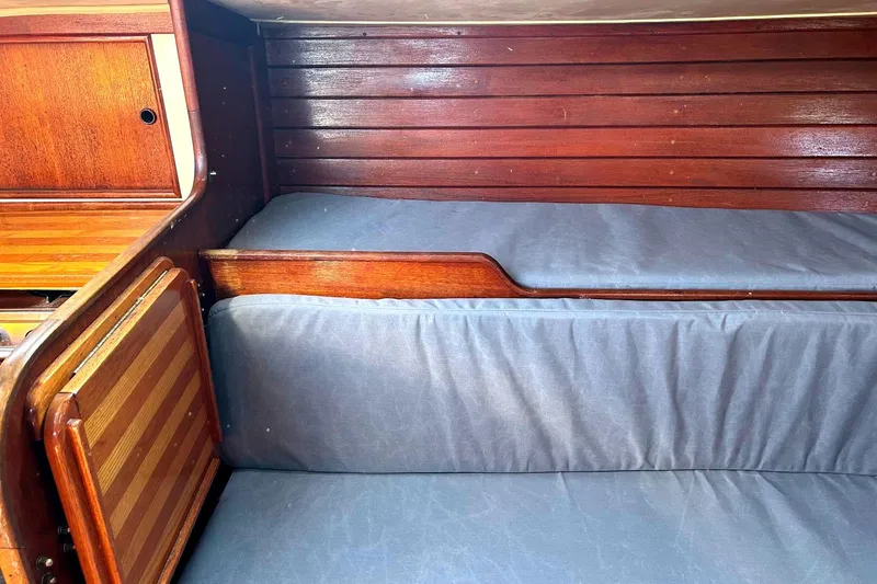 Slide: The Image of Interior of a 1982 Ericson 33 yacht with wooden finish. - 5
