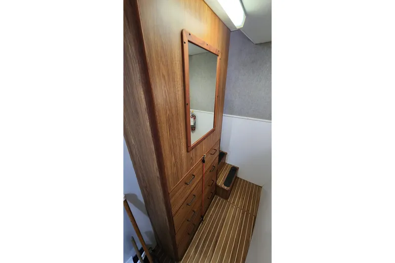 Slide: The Image of Wooden interior of 2005 Endeavour 44 TrawlerCat with mirror and drawers. - 16