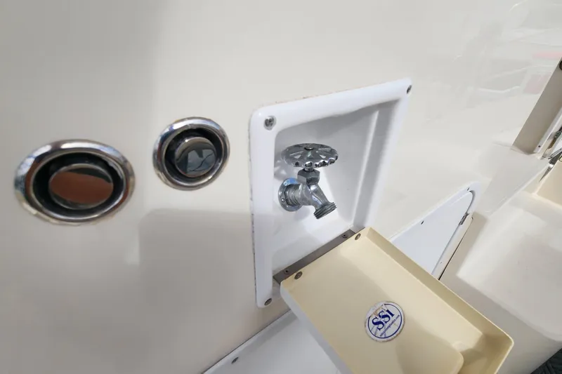 Slide: The Image of Outdoor faucet on 2005 Endeavour 44 TrawlerCat boat with drainage tray. - 53