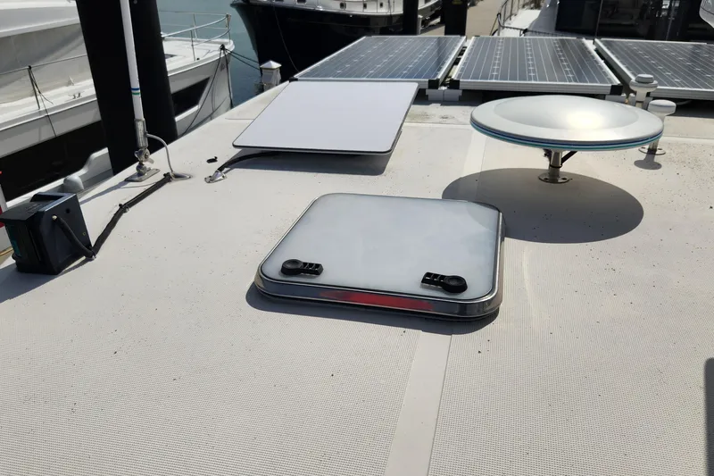 Slide: The Image of Rooftop of 2005 Endeavour 44 TrawlerCat with solar panels and marine equipment. - 68