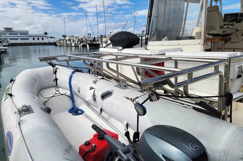 Slide: The Image of 2005 Endeavour 44 TrawlerCat docked with inflatable dinghy and motor. - 76