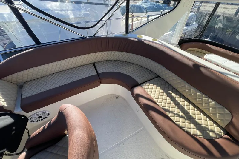 Slide: The Image of Luxurious seating area on a 2004 Meridian 459 Motoryacht with quilted upholstery. - 13