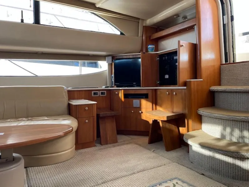 Slide: The Image of Luxurious interior of 2004 Meridian 459 Motoryacht with elegant wood finishes and comfortable seating. - 30