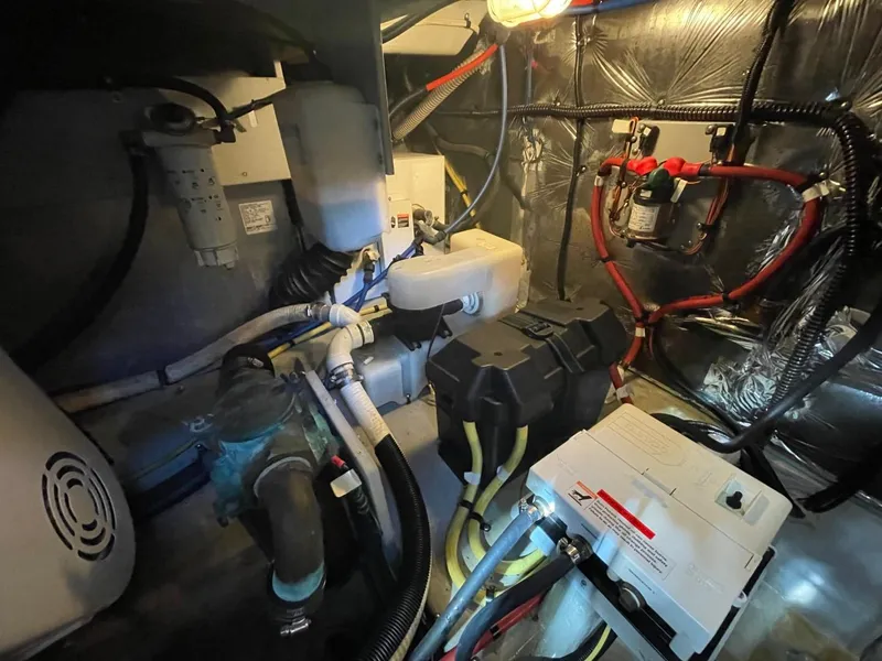Slide: The Image of Engine room of 2004 Meridian 459 Motoryacht with visible wiring and components. - 49