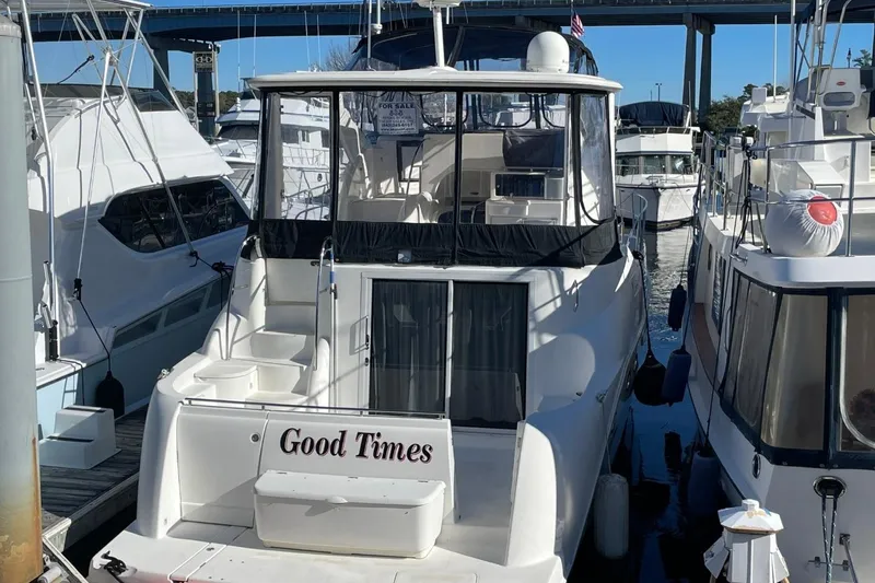 Slide: The Image of 2004 Meridian 459 Motoryacht "Good Times" docked at marina, rear view. - 6
