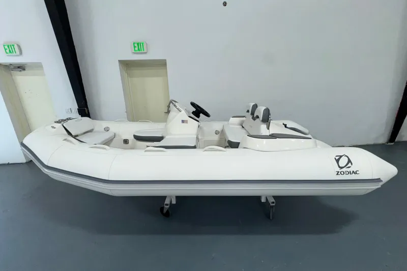 The Image of 2026 Zodiac Yachtline 400 inflatable boat in a showroom setting. - 0