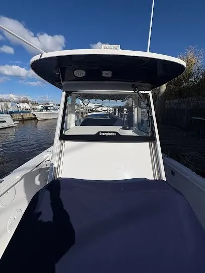 Slide: The Image of 2016 Everglades 295 Center Console boat at dock. - 10