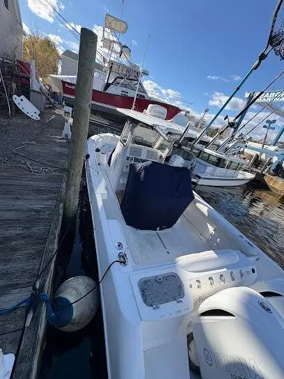 Slide: The Image of 2016 Everglades 295 Center Console boat at dock. - 4