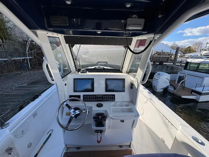 Slide: The Image of Interior view of a 2016 Everglades 295 Center Console boat. - 8