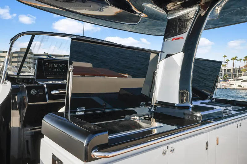 Slide: The Image of 2022 Solaris Power yacht interior with modern helm and sleek design. - 10