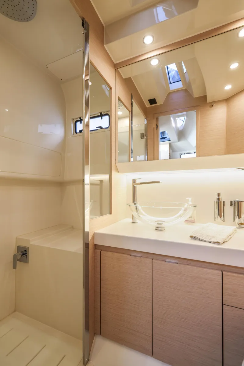 Slide: The Image of Luxurious bathroom interior of 2022 Solaris Power yacht, featuring modern fixtures and elegant design. - 17