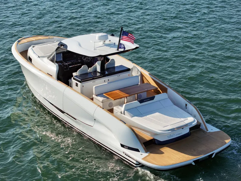 Slide: The Image of 2022 Solaris Power yacht on water, featuring open deck and fractional ownership. - 3