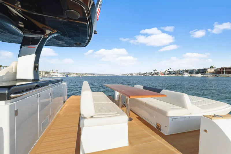 Slide: The Image of Luxurious 2022 Solaris Power yacht with open deck, offering fractional ownership. - 8