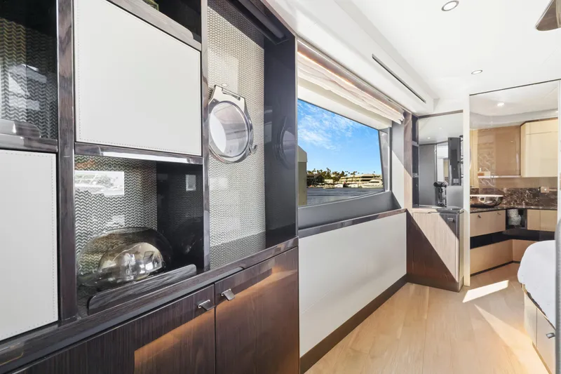 Slide: The Image of Luxurious interior of 2024 Absolute 60 Fly Co Ownership yacht with modern design and large window. - 40