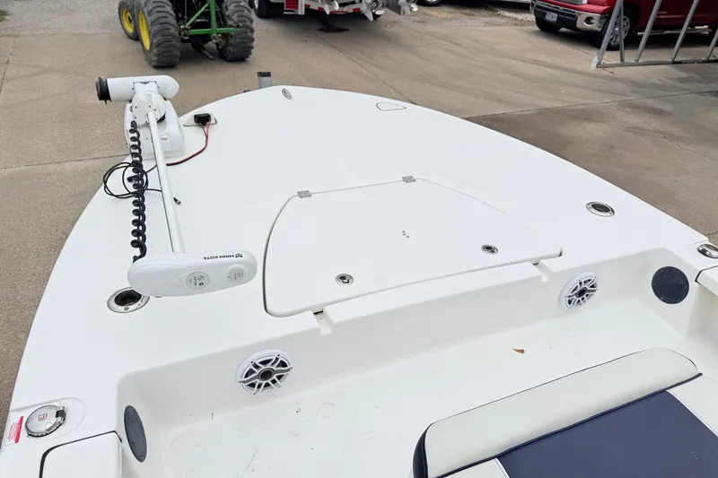 Slide: The Image of 2023 Tidewater 25 TPC Raptor boat deck with trolling motor and speakers. - 10