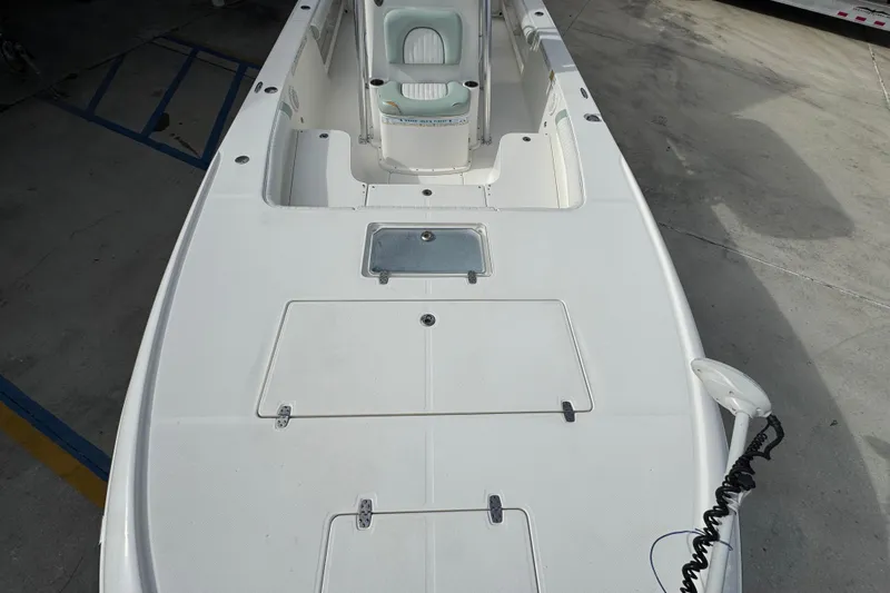 Slide: The Image of 2017 Sea Born FX25 Bay boat deck with storage compartments and seating. - 22