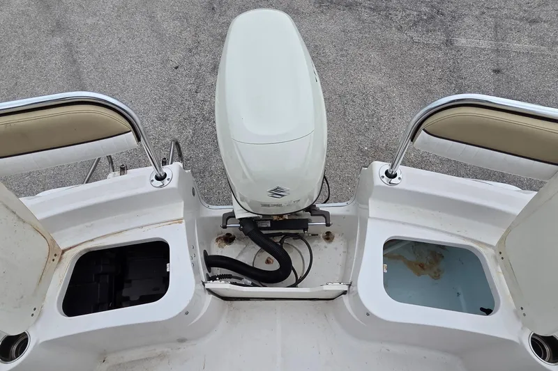 Slide: The Image of 2017 Barracuda 188 CCF boat stern with outboard motor and storage compartments. - 10