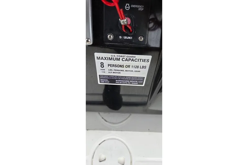 Slide: The Image of 2017 Barracuda 188 CCF boat capacity label, maximum 8 persons or 1128 lbs. - 7