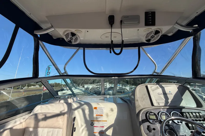 Slide: The Image of Interior view of 2017 Robalo R265 Walkaround boat cockpit with Garmin navigation system. - 29
