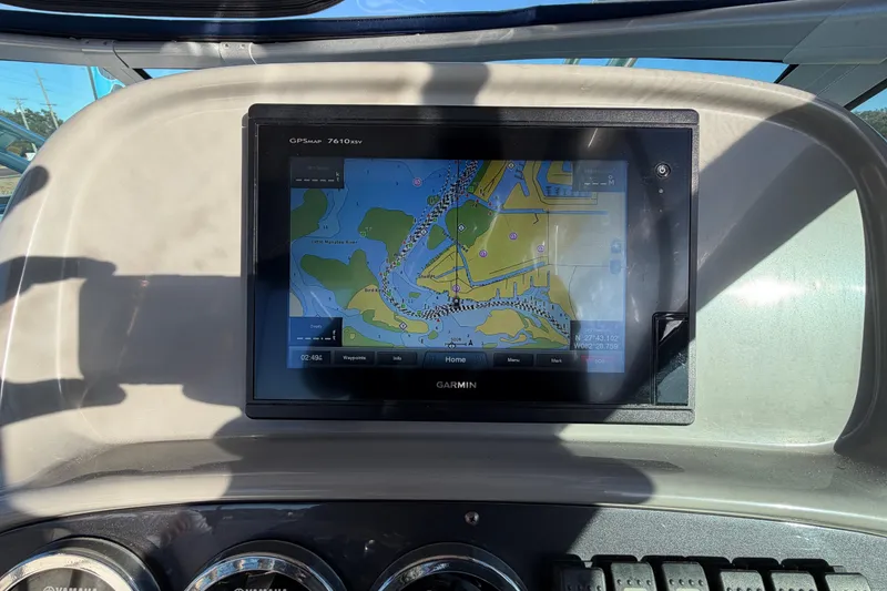 Slide: The Image of Garmin GPS display on 2017 Robalo R265 Walkaround boat dashboard. - 32