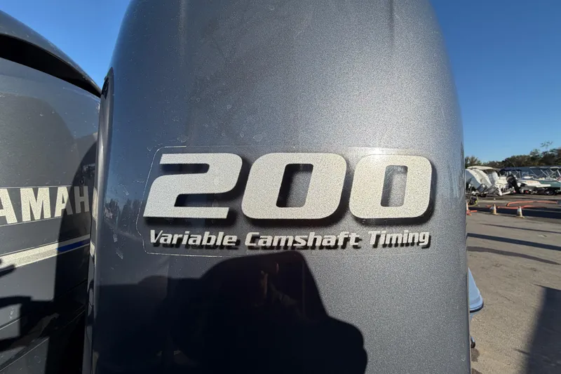 Slide: The Image of Yamaha 200 horsepower outboard engine with variable camshaft timing on a 2017 Robalo R265 Walkaround. - 5