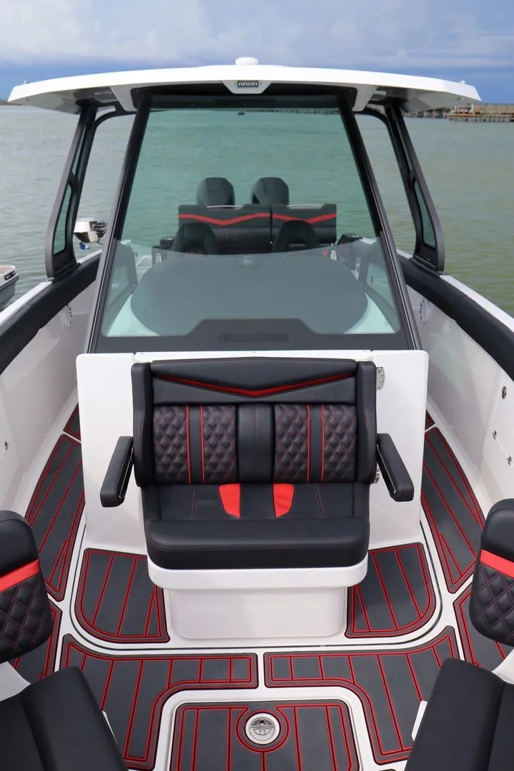 Slide: The Image of Luxurious interior of the 2026 Monterey Elite 30 OB boat. - 10