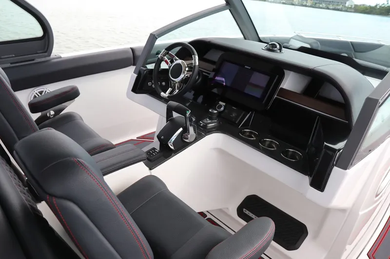 Slide: The Image of Interior of 2026 Monterey Elite 30 OB with modern dashboard. - 13