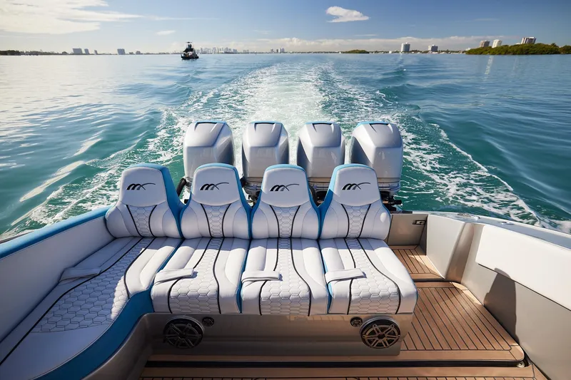 Slide: The Image of Luxury Midnight Express 43' Open boat with powerful engines cruising on clear waters. - 19
