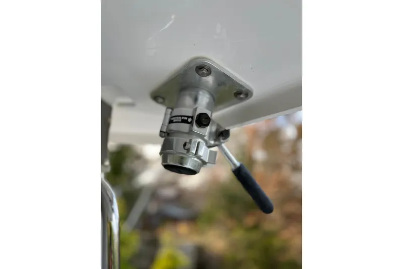 Slide: The Image of Close-up of a 2025 NorthCoast 285 HT boat component with a lever handle. - 19