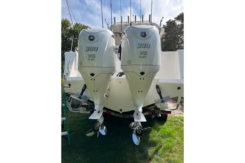 Slide: The Image of Twin Yamaha 300 V6 outboard engines on a 2025 NorthCoast 285 HT boat. - 2