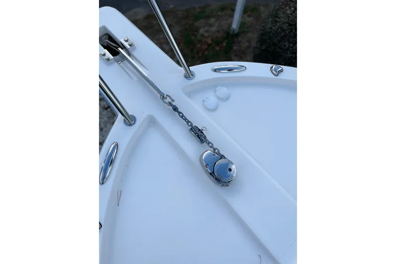 Slide: The Image of Bow of 2025 NorthCoast 285 HT boat with anchor chain and cleats. - 22