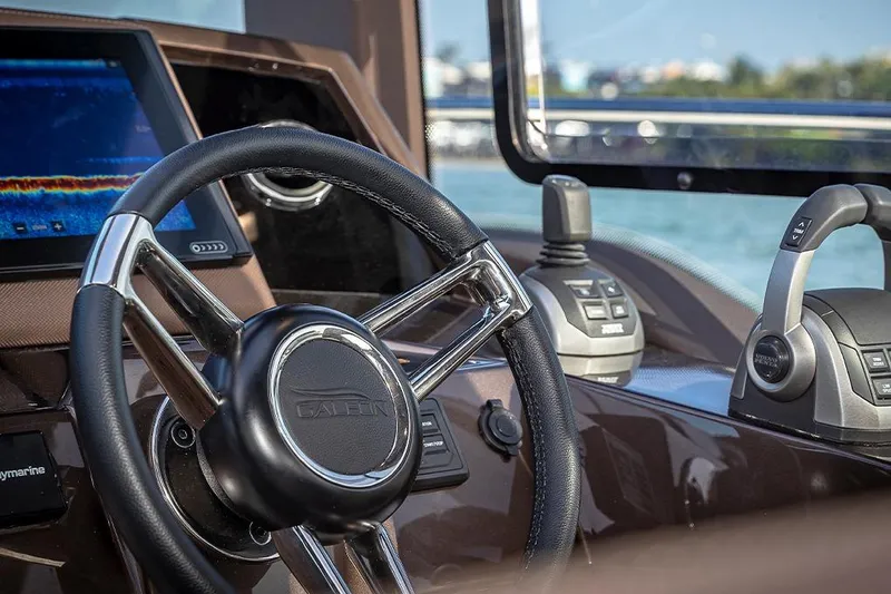 Slide: The Image of Luxurious 2023 Galeon 425 HTS yacht interior with waterfront cityscape view. - 11