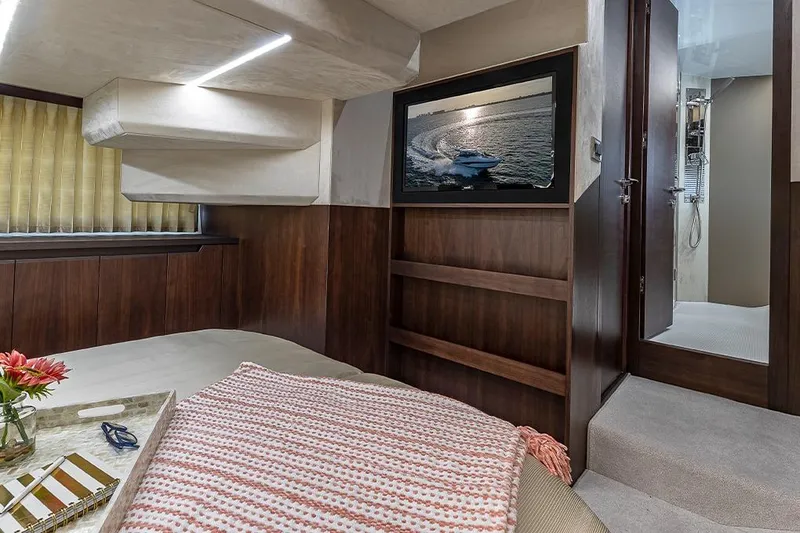 Slide: The Image of 2023 Galeon 425 HTS yacht interior with modern design and waterfront view. - 15