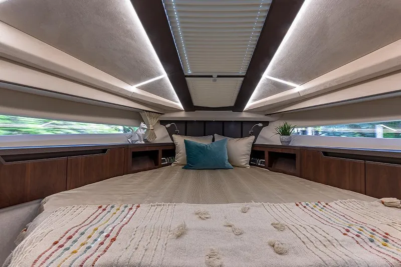 Slide: The Image of Interior of 2023 Galeon 425 HTS yacht with elegant seating and waterfront view. - 17