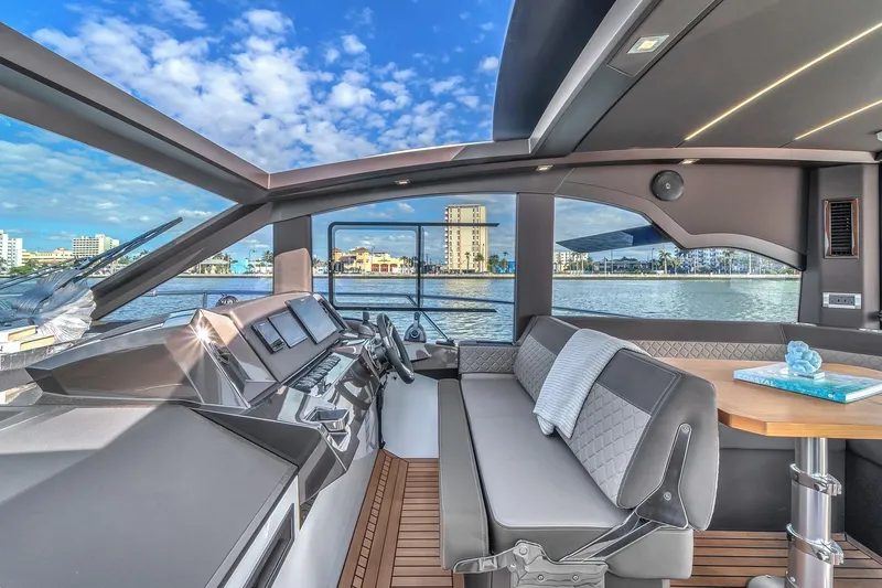Slide: The Image of Luxurious interior of 2023 Galeon 425 HTS yacht with modern design and waterfront view. - 21