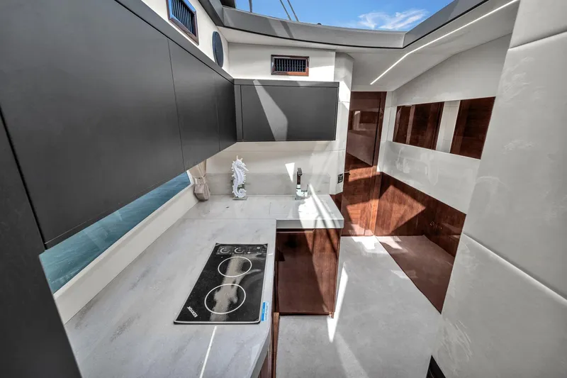 Slide: The Image of Modern kitchen interior of 2023 Galeon 425 HTS yacht with sleek design and appliances. - 26