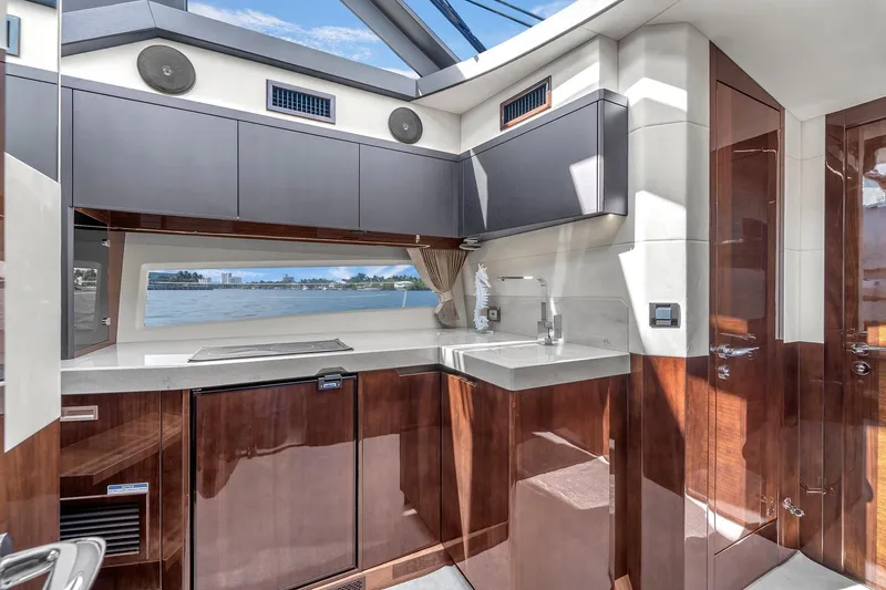 Slide: The Image of Luxurious interior of 2023 Galeon 425 HTS yacht with modern kitchen design. - 27