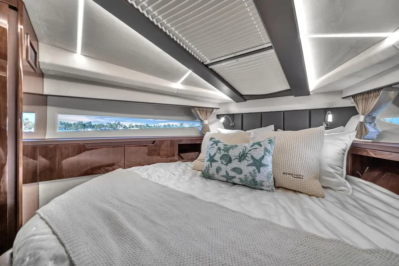 Slide: The Image of Luxurious interior of 2023 Galeon 425 HTS yacht with elegant bedding and modern lighting. - 31