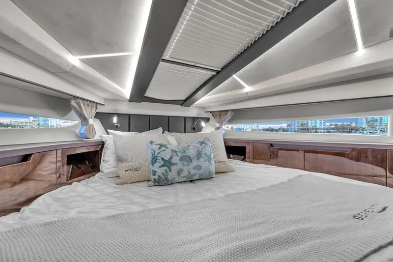 Slide: The Image of Luxurious interior of 2023 Galeon 425 HTS yacht with elegant bedding and modern design. - 32