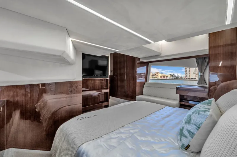 Slide: The Image of Luxurious interior of 2023 Galeon 425 HTS yacht with elegant bedroom and scenic window view. - 37