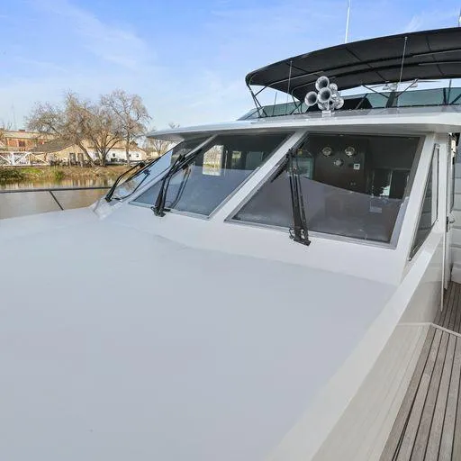 Slide: The Image of 1991 Vic Franck 65 Pilot House yacht with sleek design and spacious deck. - 17