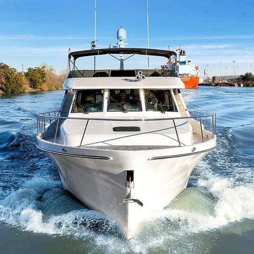 Slide: The Image of Vic Franck 65 Pilot House 1991 yacht cruising on a sunny day. - 6