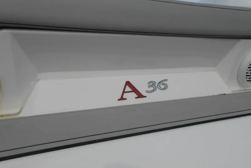 Slide: The Image of 2020 Cobalt A36BR boat model emblem on white surface. - 19