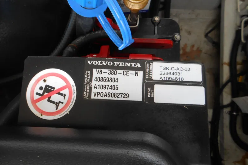 Slide: The Image of Volvo Penta engine label on 2020 Cobalt A36BR boat, featuring model and safety information. - 24
