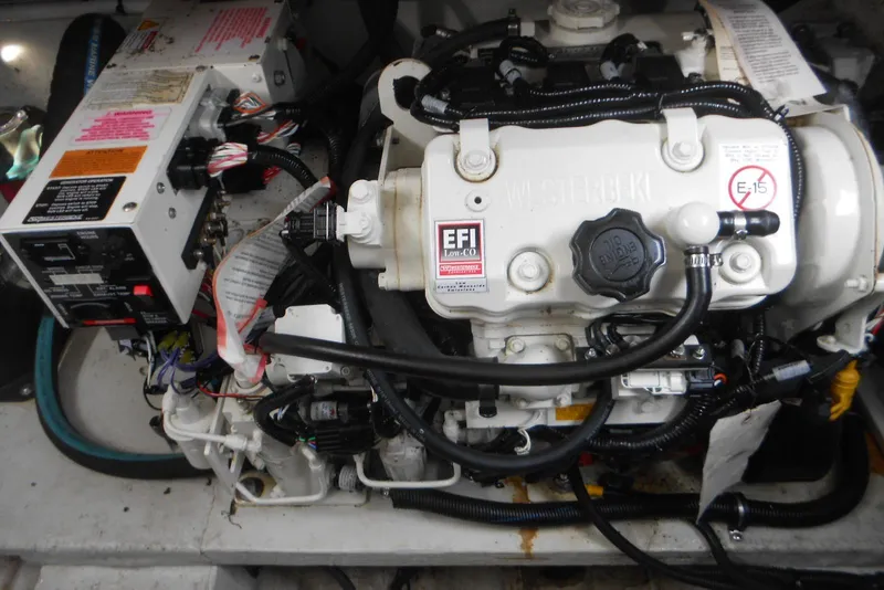 Slide: The Image of Engine compartment of a 2020 Cobalt A36BR boat, featuring a Westerbeke EFI engine. - 25