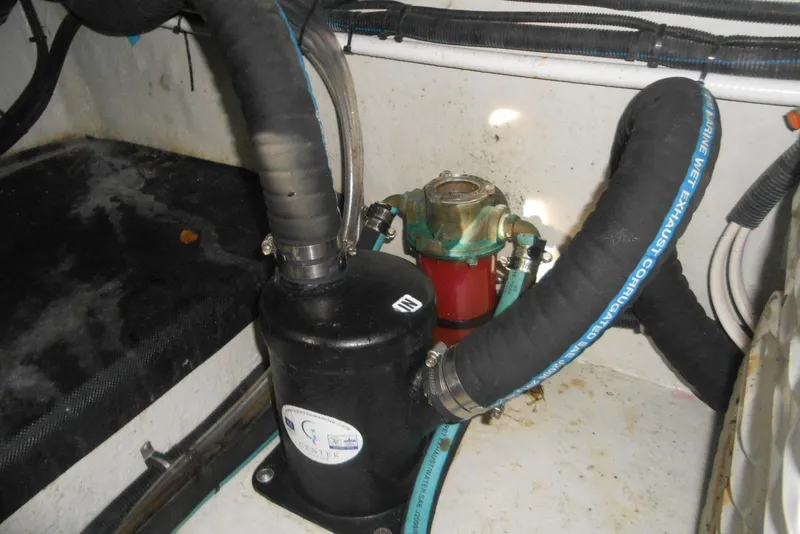 Slide: The Image of Engine compartment of 2020 Cobalt A36BR boat showing hoses and components. - 27