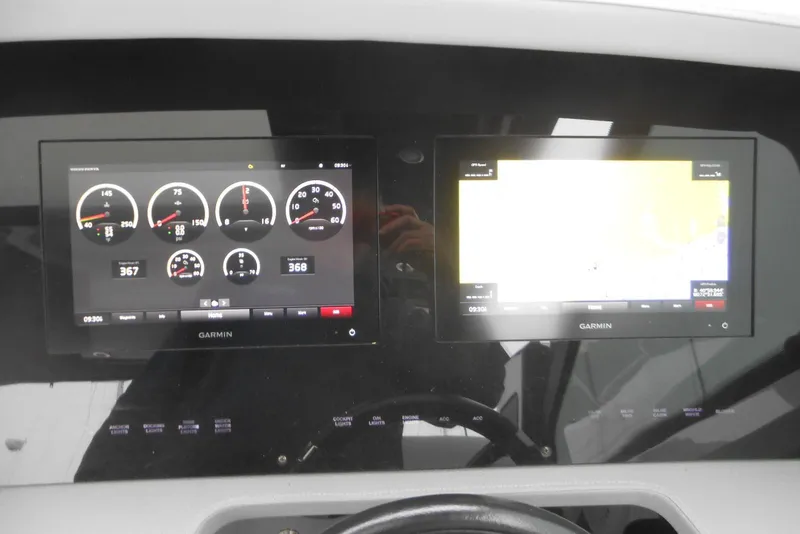 Slide: The Image of Dashboard of a 2020 Cobalt A36BR boat with Garmin displays. - 39