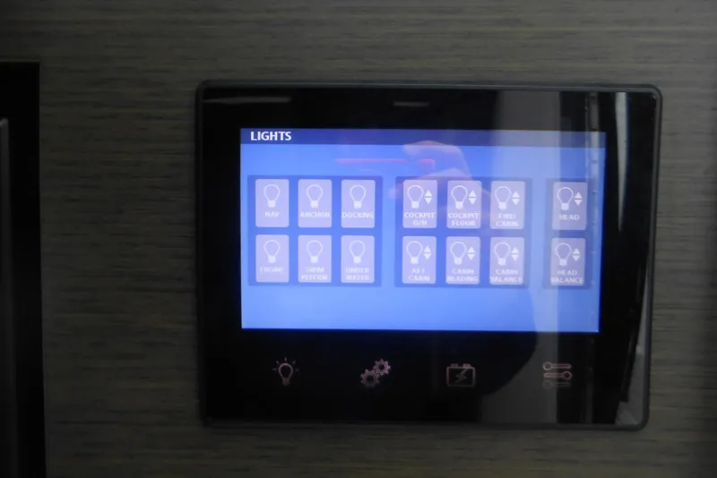 Slide: The Image of Touchscreen light control panel on 2020 Cobalt A36BR boat dashboard. - 47