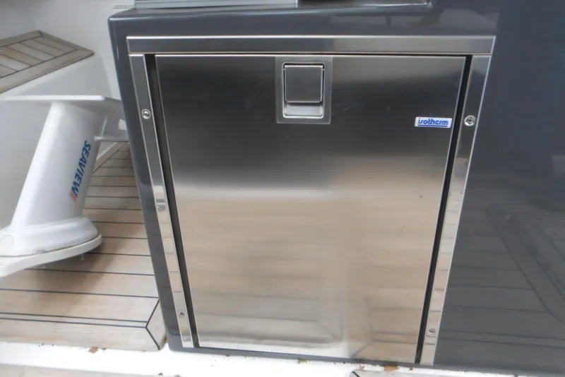 Slide: The Image of Stainless steel compartment on 2020 Cobalt A36BR boat deck. - 51